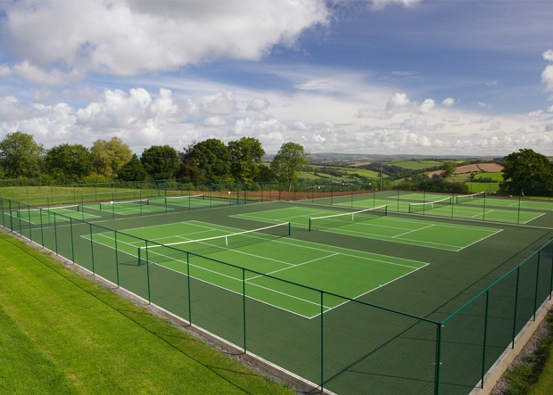 Take inspiration from Wimbledon and book a tennis break at Highbullen Hotel Golf & Country Club